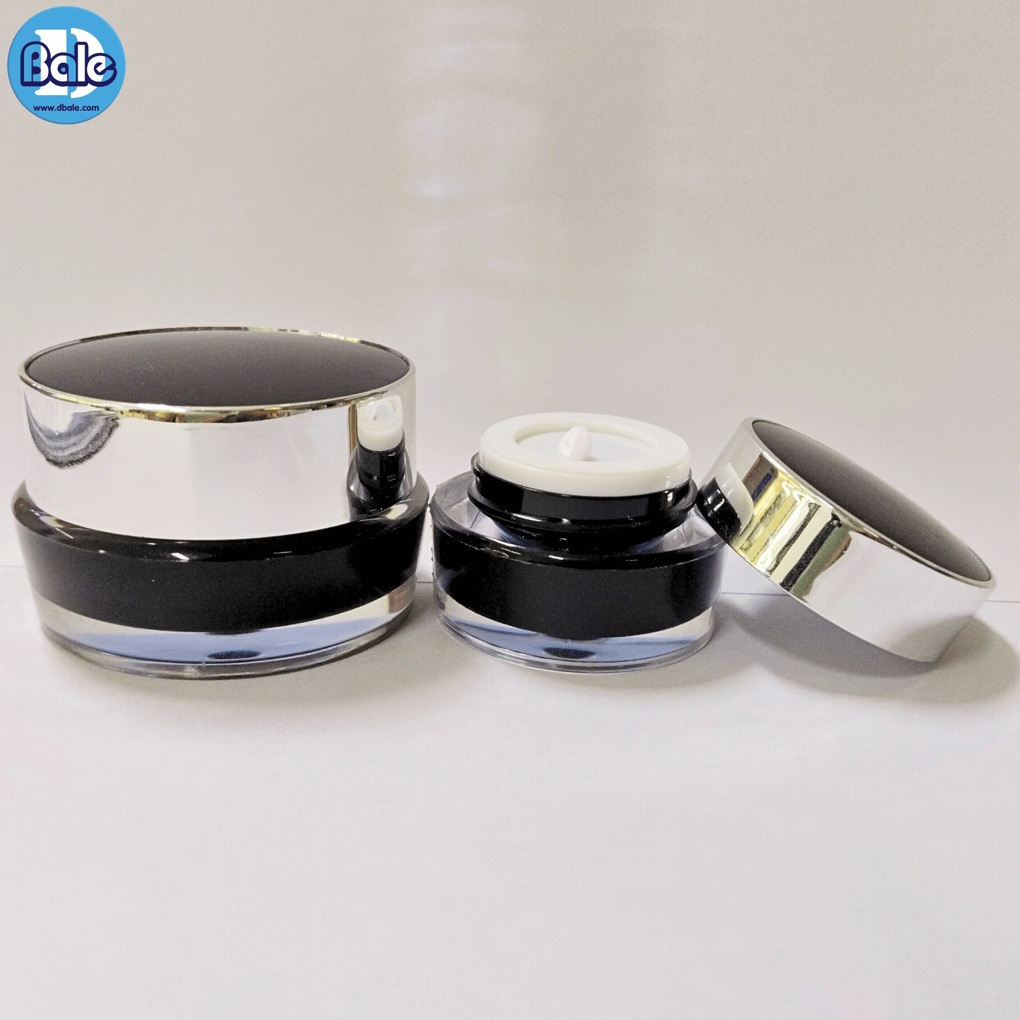 k0128 5g. กระปุกครีมอะคริลิกทรงกลมสีดำฝาขอบเงินเงา 5g.